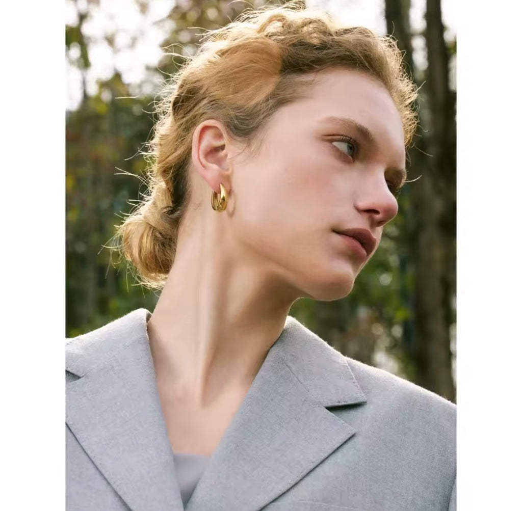 Product Description&nbsp;

Modern Elegance, Everyday Confidence

Meet The Nova Hoops — a contemporary take on the classic hoop earring. Featuring a sleek geometric U-shape design, these elegant earrings bring a modern, polished finish to any outfit.

Minimal yet eye-catching, they're designed for women who love timeless jewellery with a modern edge.

Why These Earrings Matter

The best jewellery doesn't need to be complicated.

The Nova Hoops are designed to be the earrings you reach for every day. Their cl