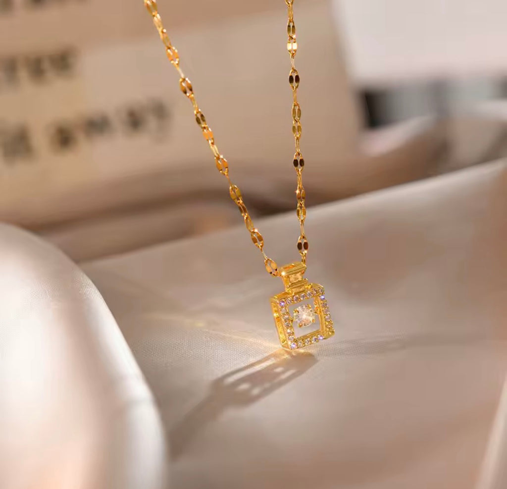 Close-Up of The Sillage Perfume Bottle Pendant Necklace