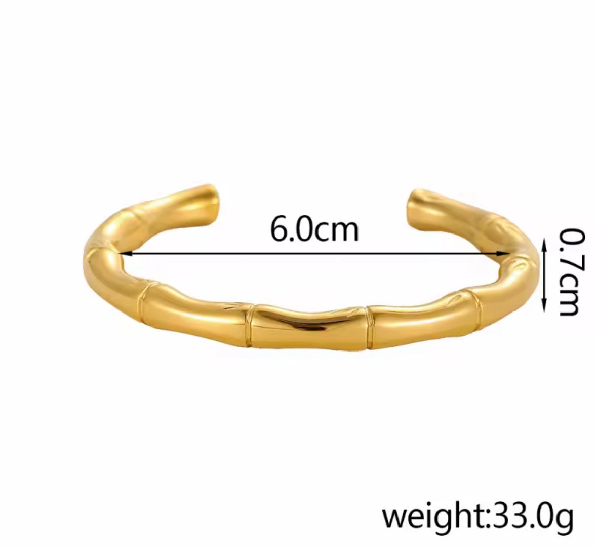 Shop The Kaori Bangle – a bamboo-inspired 316L stainless steel open bangle with 18K PVD gold plating. Waterproof, tarnish-resistant and hypoallergenic.