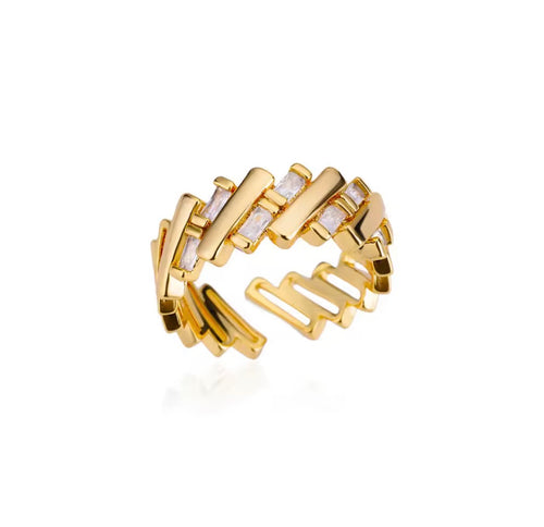 The Axis Ring with a geometric design on a white background