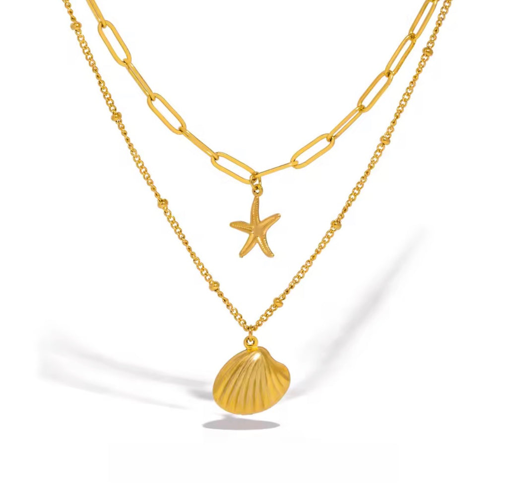 The Calypso Necklace | Waterproof Layered Shell & Starfish Necklace    pendants on a white background