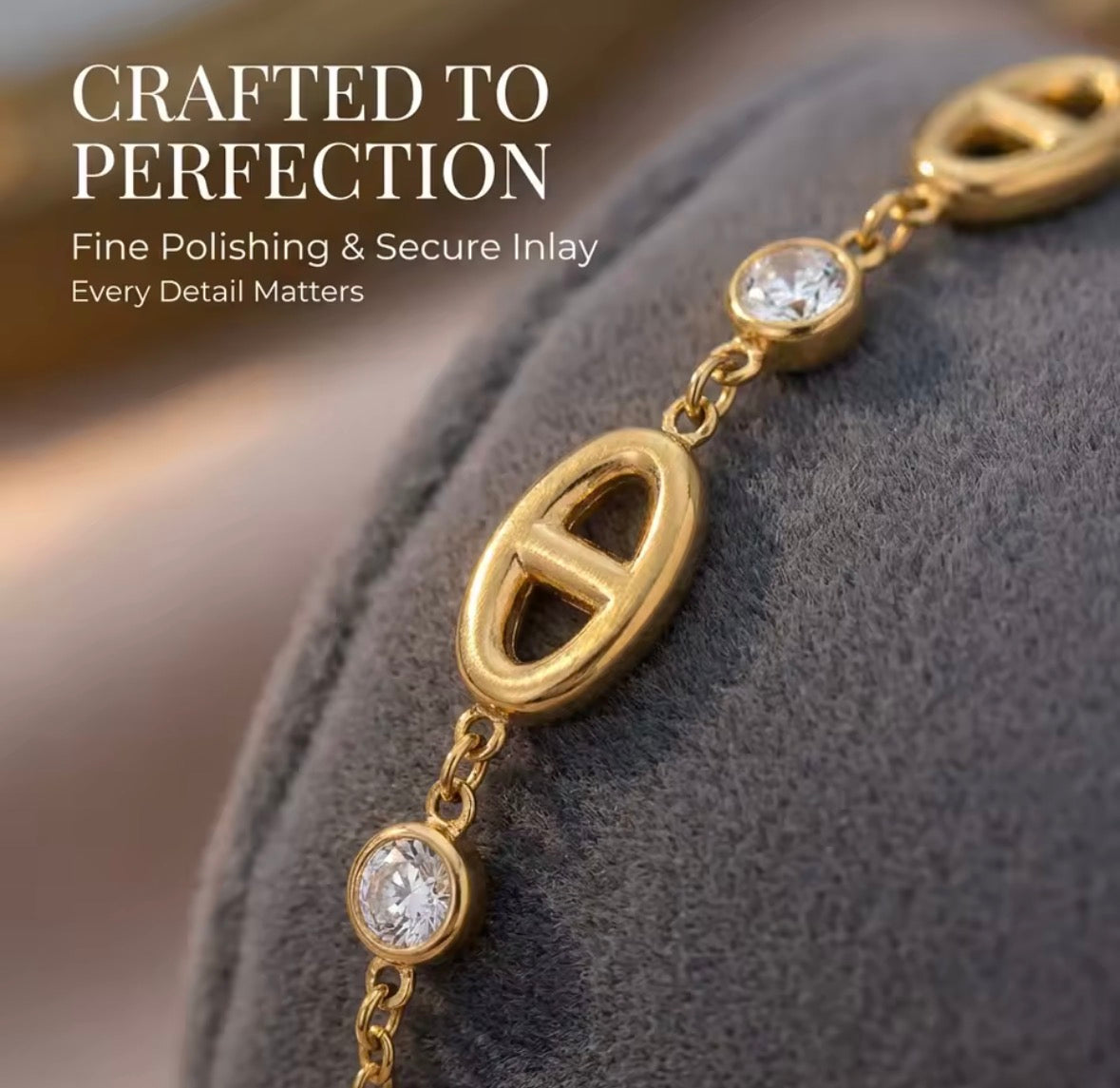 Shop The Celestine Bracelet – an elegant gold-tone stainless steel bracelet with geometric oval motifs and sparkling white zircon accents. Adjustable and hypoallergenic.