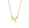The Eloise Necklace: Gold bow-shaped pendant on a chain against a white background