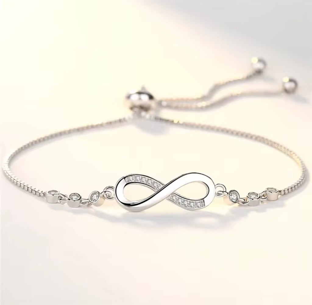 The Endless Love Bracelet Silver bracelet with an infinity symbol on a light gray background