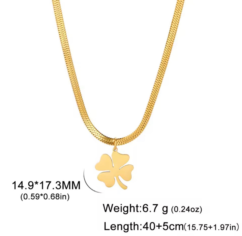 The Felicity Necklace: Gold four-leaf clover necklace with measurements on a white background