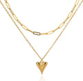The Fiera Necklace heart pendant necklace on a white background
