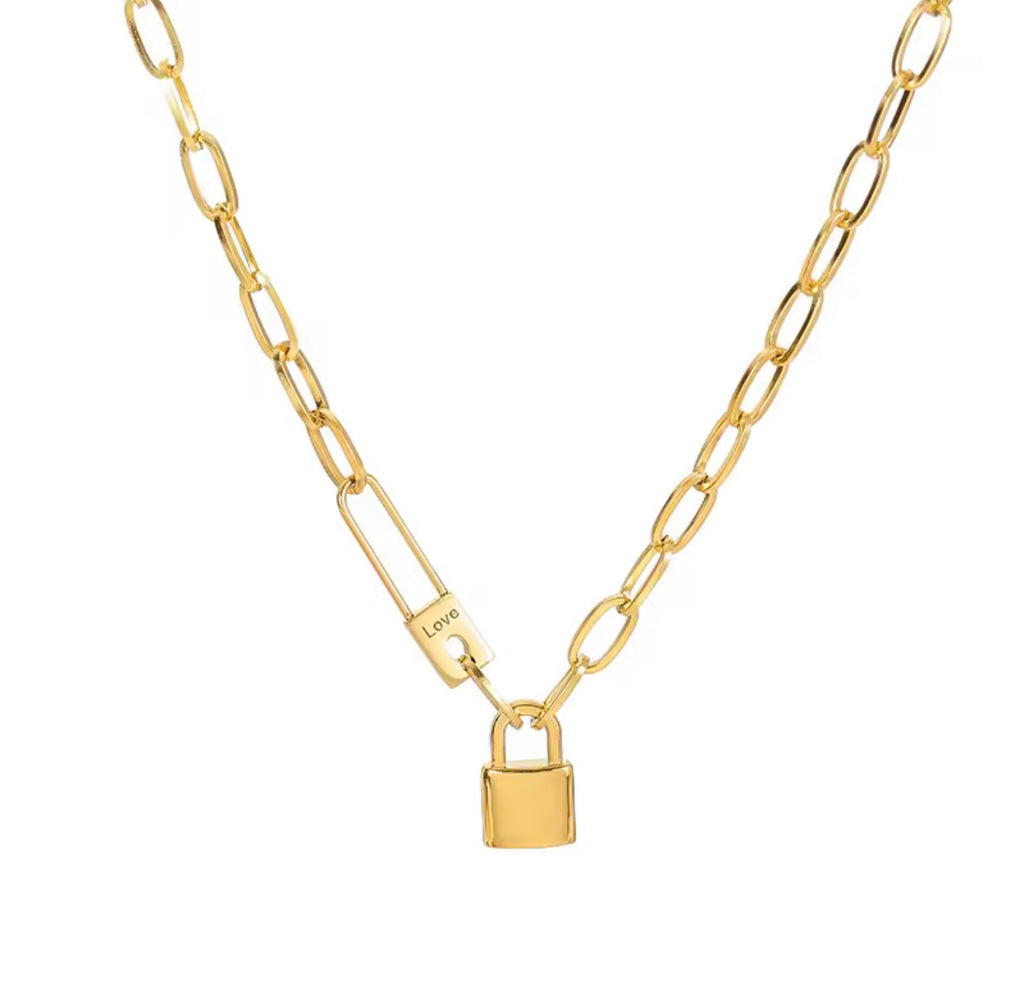 The Heartlock Necklace | Waterproof Heart Lock Pendant Necklace for Women Gold chain necklace with a padlock pendant on a white background