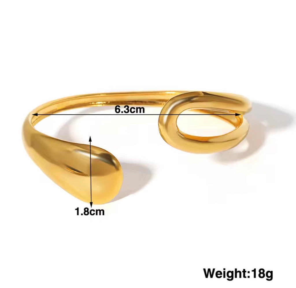 The Imperia Bangle Gold bracelet with measurements and weight on a white background