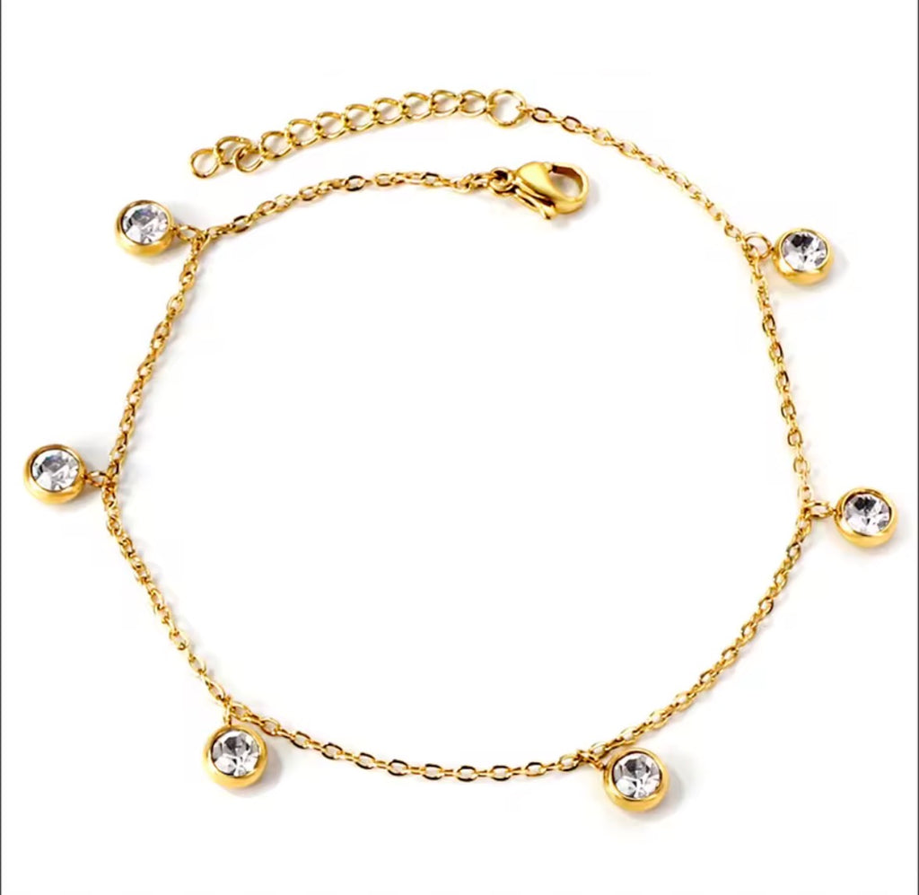 The Isla Anklet with crystal beads on a white background
