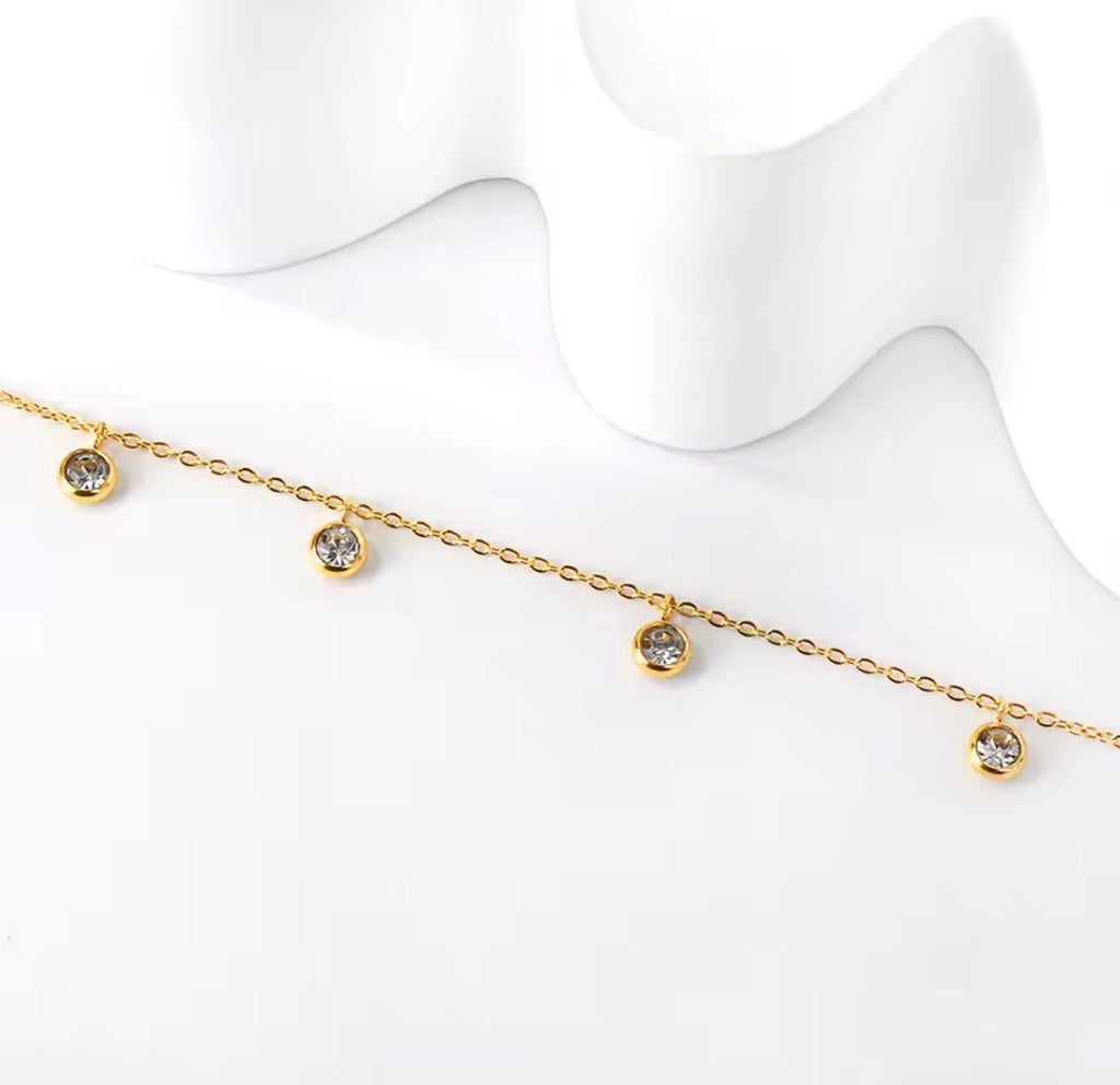 The Isla Anklet  with small diamonds on a white background