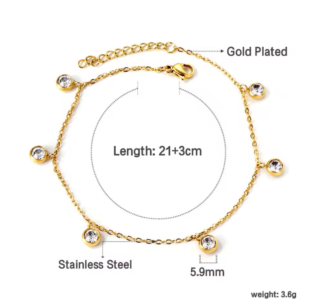 The Isla Anklet with stainless steel components, showing length, material details, and weight.