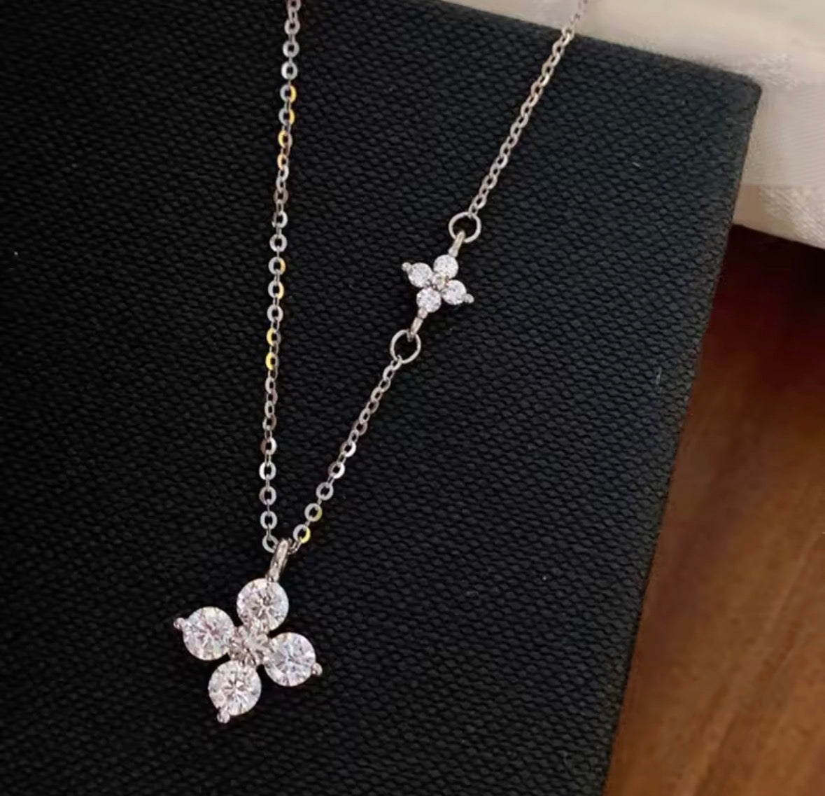 Shop The Ivy Necklace – an elegant floral pendant necklace with sparkling cubic zirconia details. Delicate, feminine and perfect for everyday wear or gifting.
