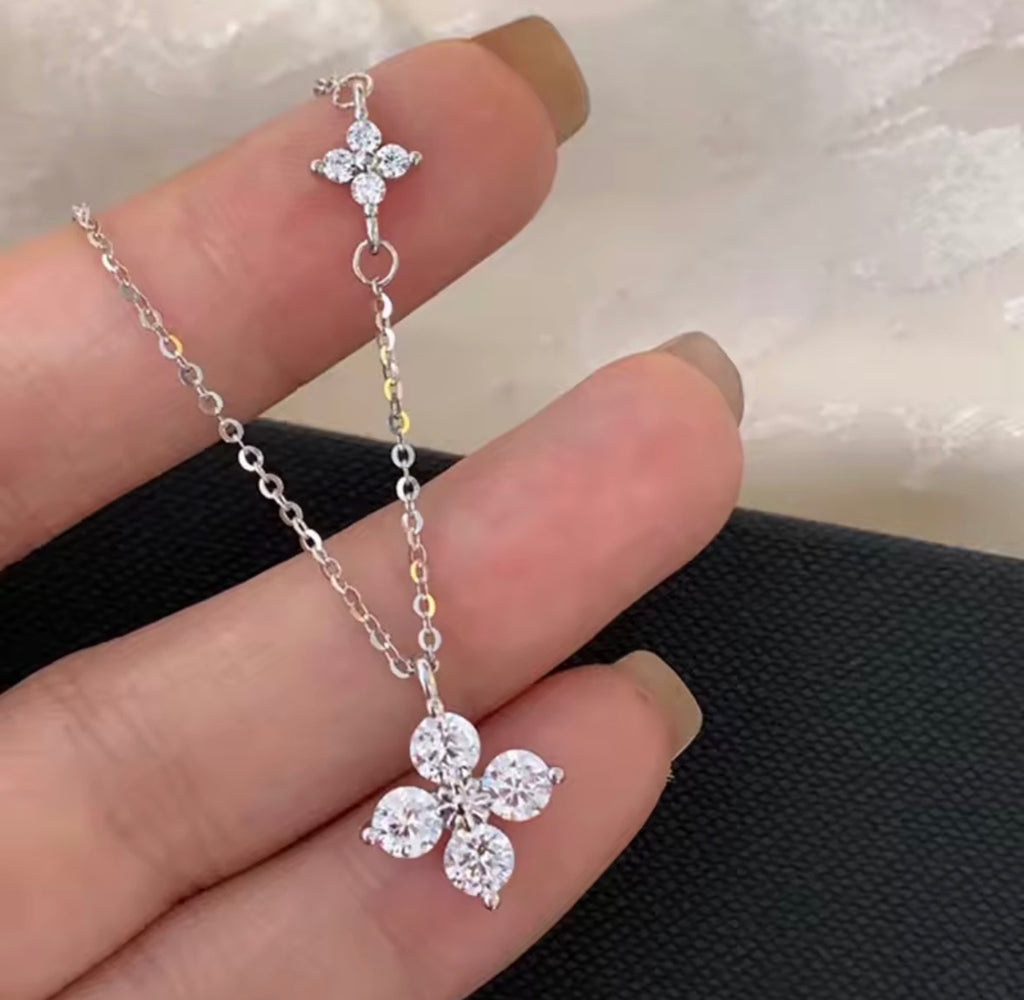 Shop The Ivy Necklace – an elegant floral pendant necklace with sparkling cubic zirconia details. Delicate, feminine and perfect for everyday wear or gifting.
