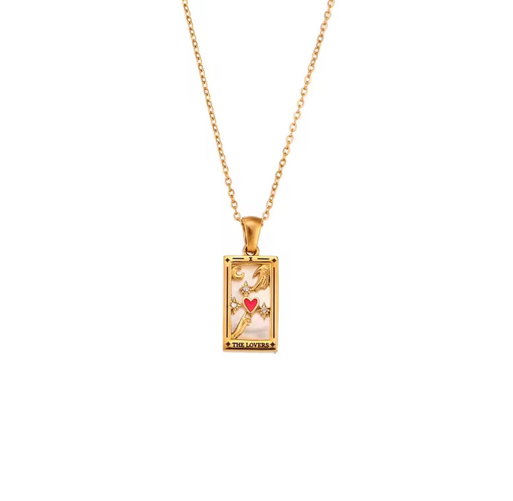The Lovers Necklace: Gold necklace with tarot card pendant on a white background