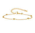 The Oriana Anklet | Waterproof Gold Beaded Chain Anklet for Women Gold bracelet with a clasp on a white background