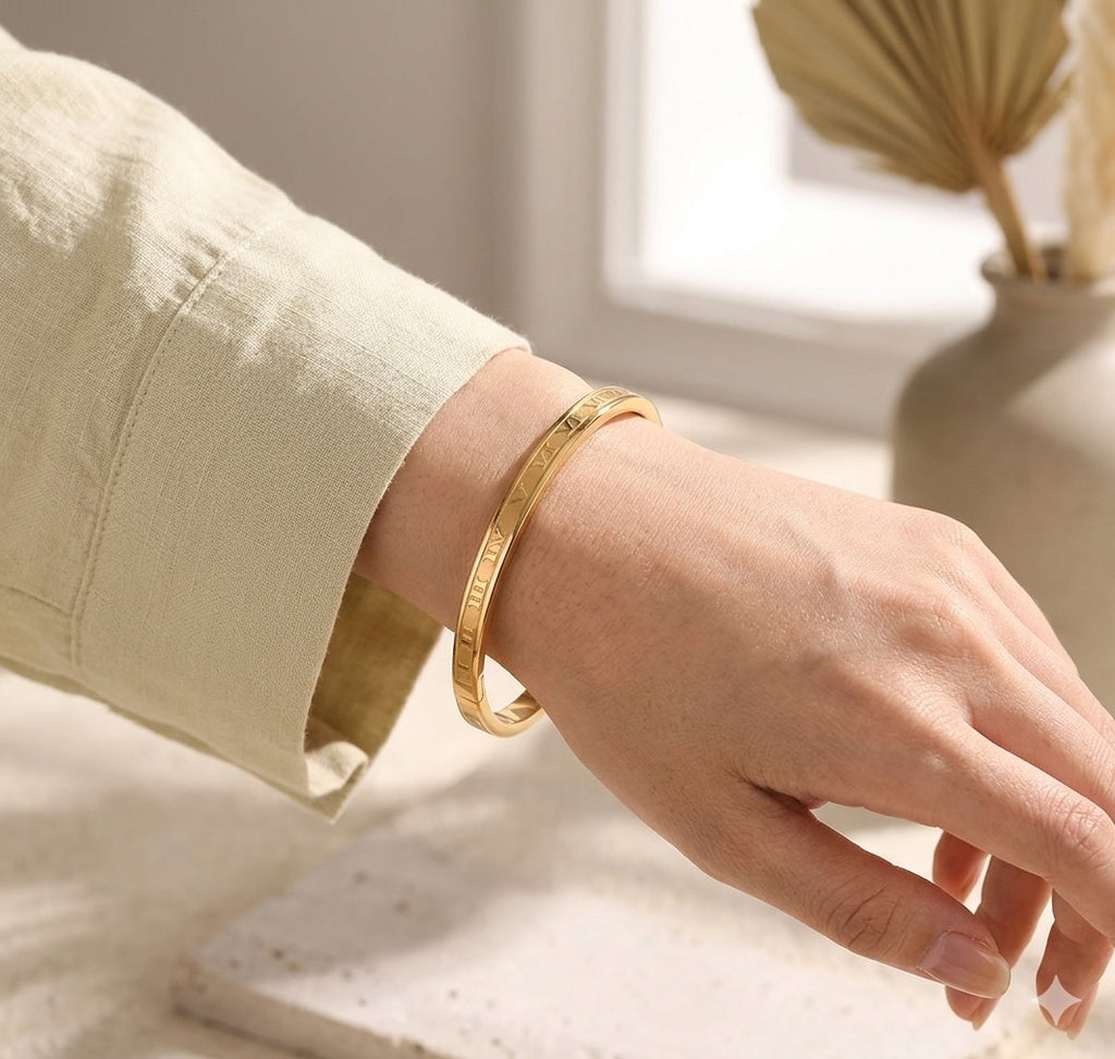 The Romanova Bangle bracelet on a wrist with a neutral background