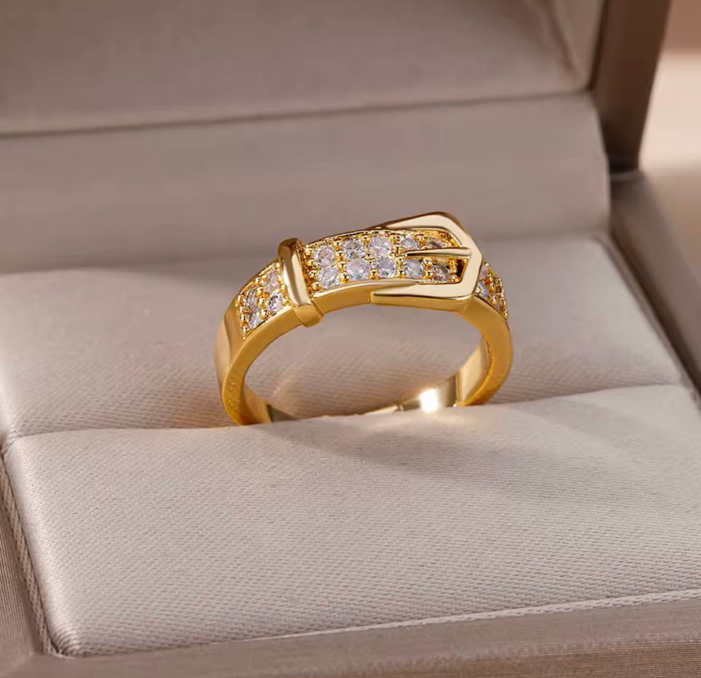 The Vincenza Ring  with embedded diamonds on a soft fabric surface