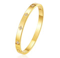 The Zaria Cuff bracelet with floral designs on a white background