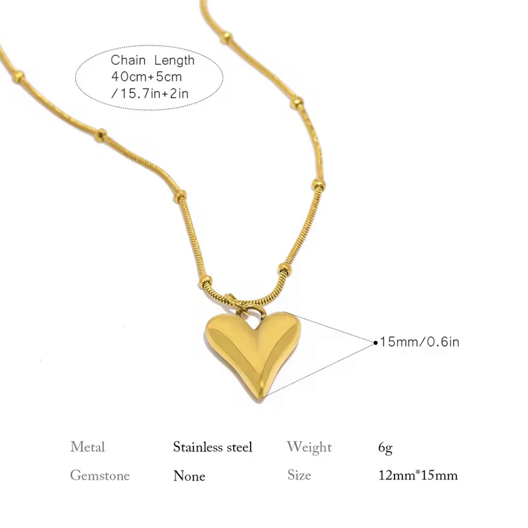 The Amara Necklace is a gold heart-shaped necklace with chain length, metal type, weight, and size information on a white background.